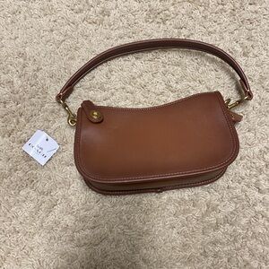 Brown coach purse, new with tags, never used.